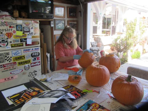Melissa carving pumpkin