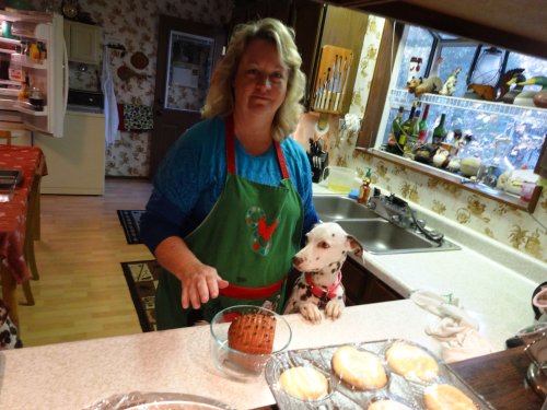 Dixie trying to help mom cook