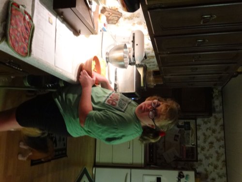 Melissa assisting with dinner