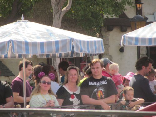 family waiting to ride Dumbo