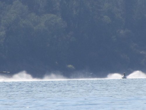 Family on watercraft at the lake