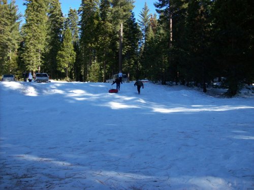 Family heading back to top of the hill 