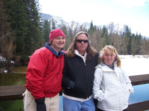 Dad and kids on bridge 