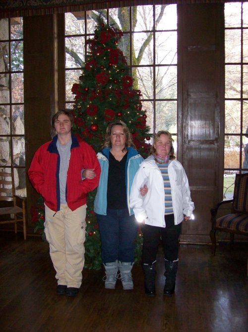 Family by Christmas tree in Ahwahnee hotel 