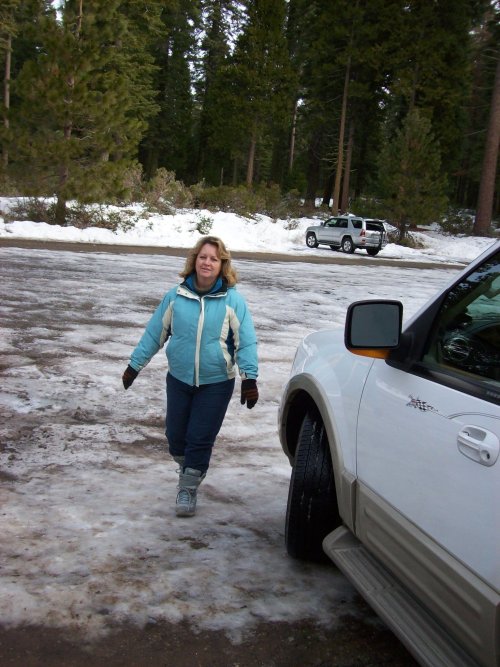 Lori in parking lot of snow play area 