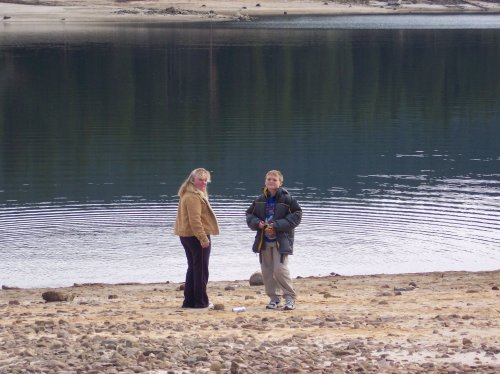 Melissa & Jonny throwing rocks in the lake 