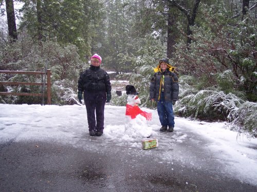 Jonny and Melissa by completed snowman 