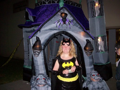 Bat Girl Missy entering her Halloween party 