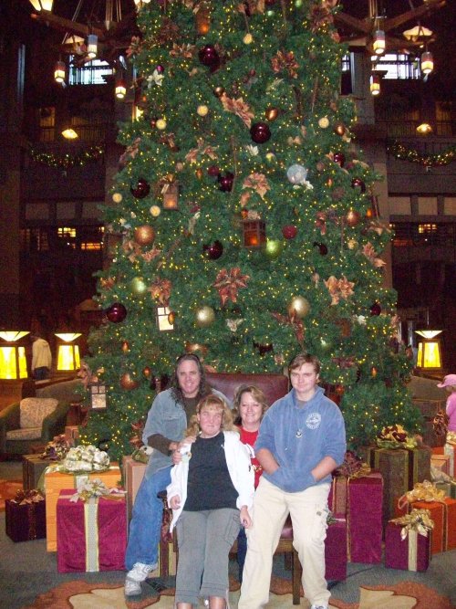 Family in front of Christmas tree at Grand Californian 