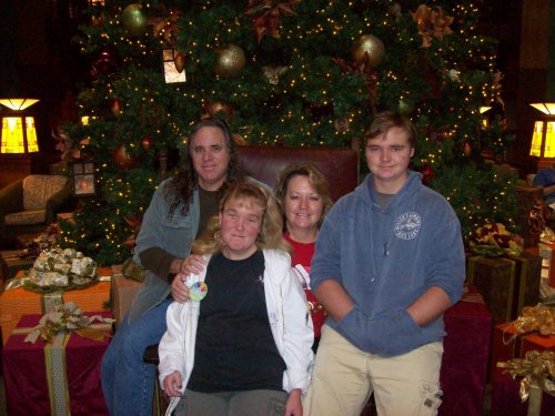 Family in front of Christmas tree at Grand Californian 