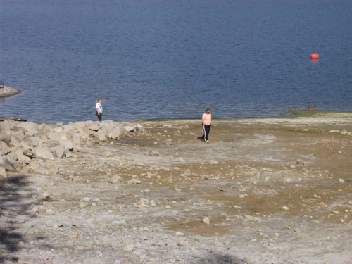 Missy and mom by the shore 