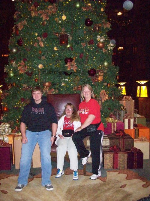 Family by Christmas tree in Grand Californian 