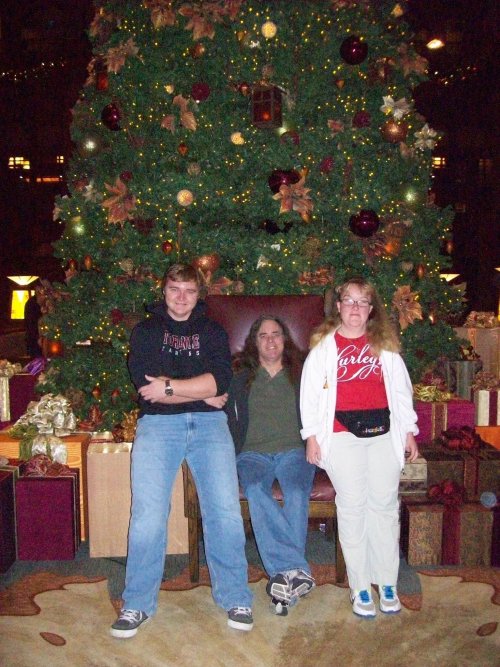 Family by Christmas tree in Grand Californian 