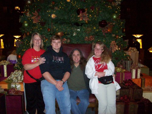 Family by Christmas tree in Grand Californian 