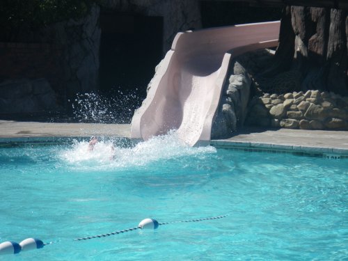 Jon submerging from slide 