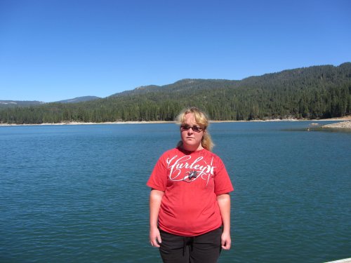 Missy standing by the lake 