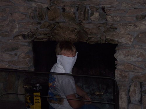 Jonny cleaning out fireplace 