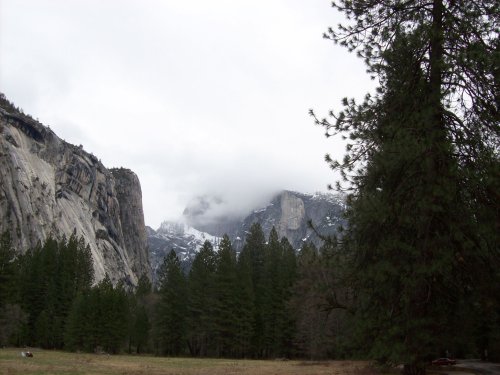 Half Dome behind clouds 