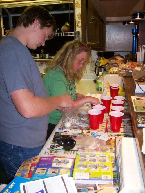 Kids coloring eggs for Easter 