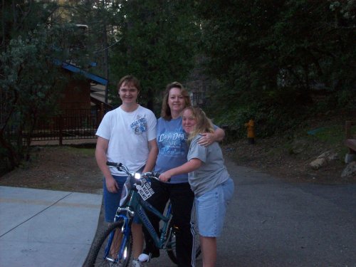 Family and mom's new bicycle 