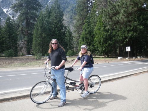 Dad and Melissa on bicycle 