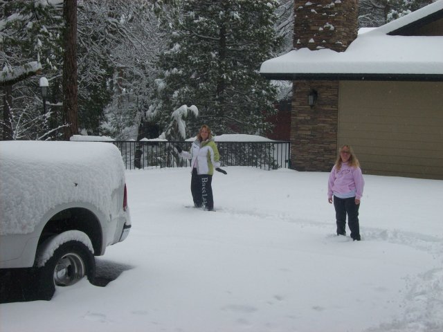 mom and Melissa playing in the snow 
