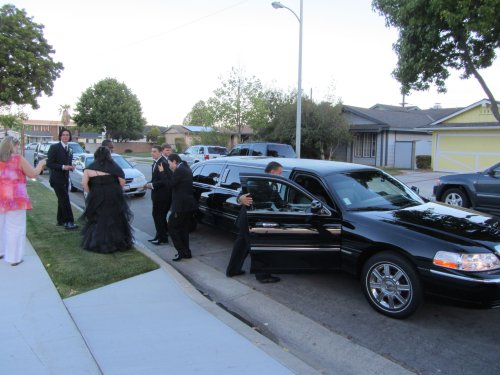 Jonny and friends boarding their limousine 