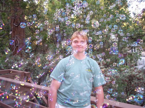 Jonny surrounded by bubbles 