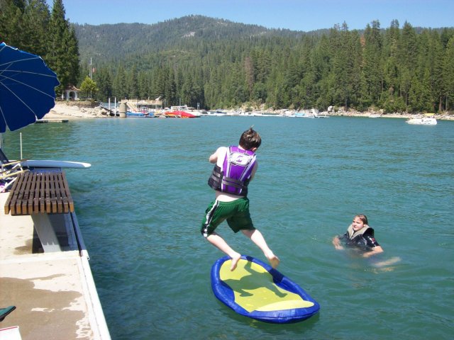 Lamar jumping in the lake 