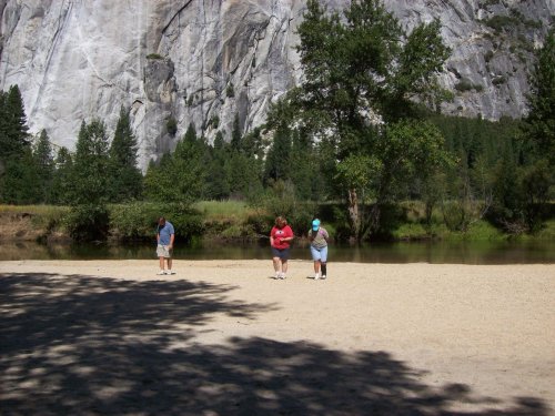 Family picking up rocks 