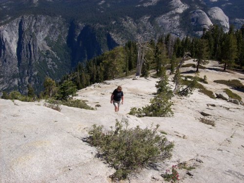 Lori hiking up the dome 
