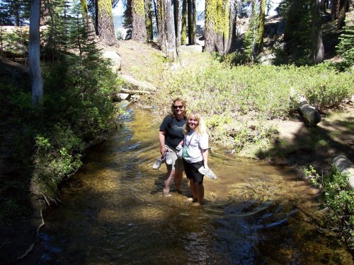 Mom and Missy wading across stream 