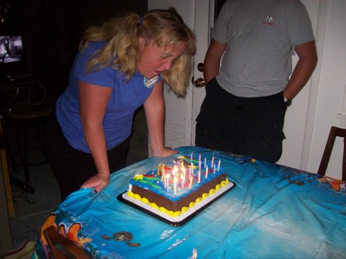 Melissa blowing out candles 