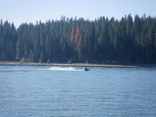 Family heading across the lake 