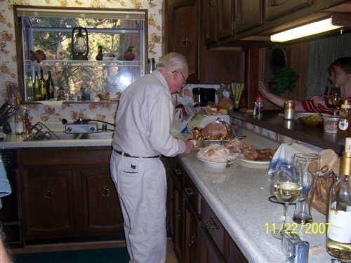 Grandpa filling his plate 