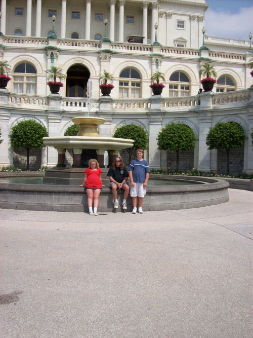 Family by fountain at U.S. capitol 