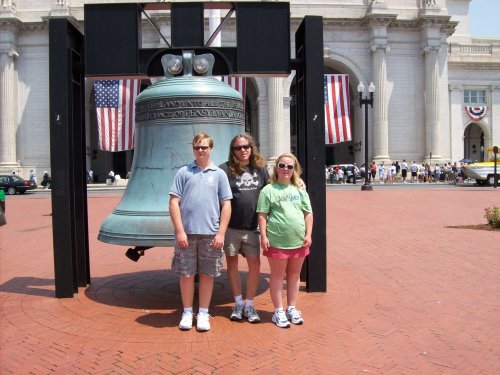 Family by American Legion Freedom Bell in front of Union Station 