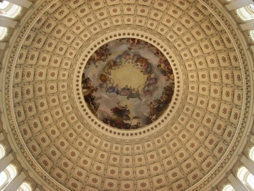 Family hiking across meadow 