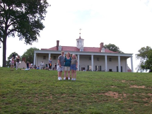 Family on back lawn of Mount Vernon 