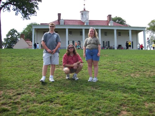 Family on back lawn of Mount Vernon 