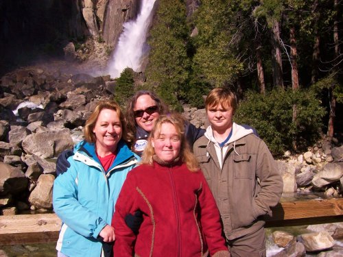 Family in front of lower yosemite Falls 
