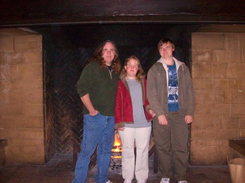 Jon, Melissa & Jonny in front of fireplace at the Ahwahnee 