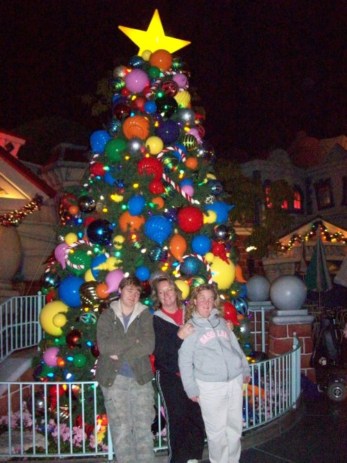 Family by Christmas tree in Toon Town 